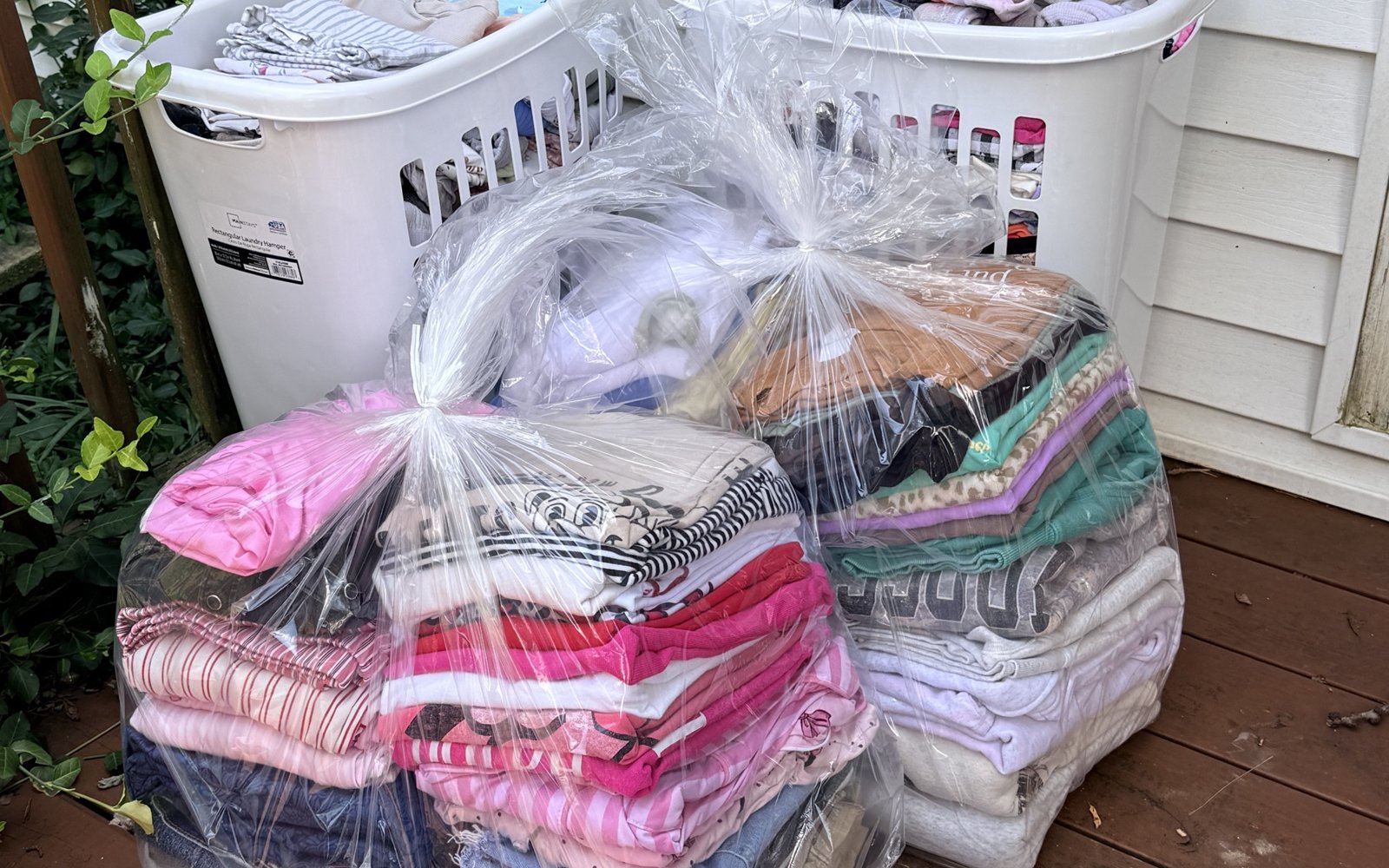 Freshly folded, bagged laundry ready for pickup at Top Tier Coin Laundry